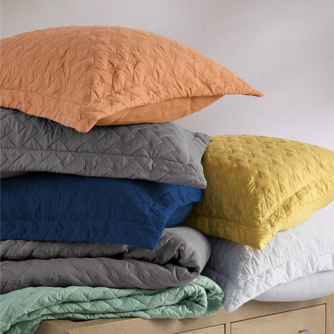 Bedsure queen-size quilt set arranged on a bed for a complete look.