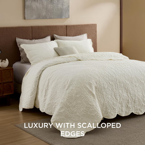Bedsure quilt leaf design close-up highlights elegant cream-yellow country charm.