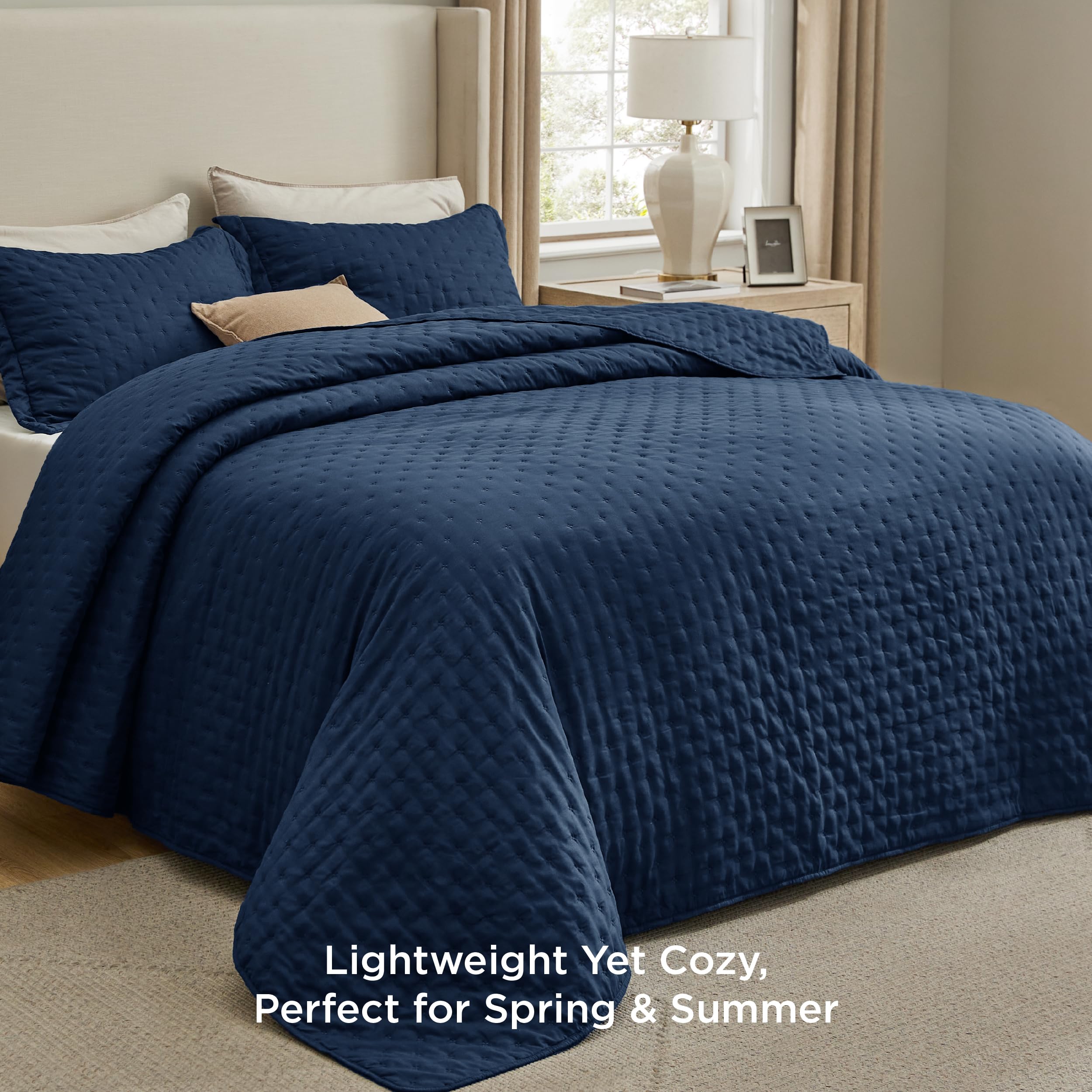 Bedsure navy brushed-polyester fabric close-up highlighting soft, breathable texture.