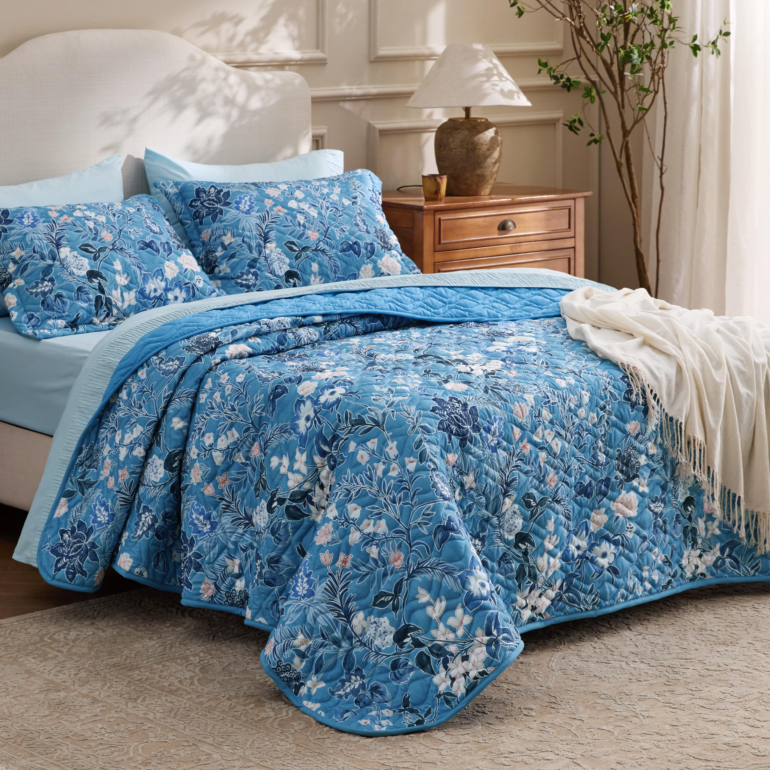 Bedsure reversible design with garden vine and sea motif for two looks.