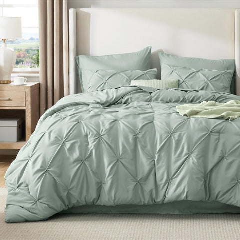 Bedsure sage green comforter with pinch-pleat pattern for refined bedroom aesthetic.