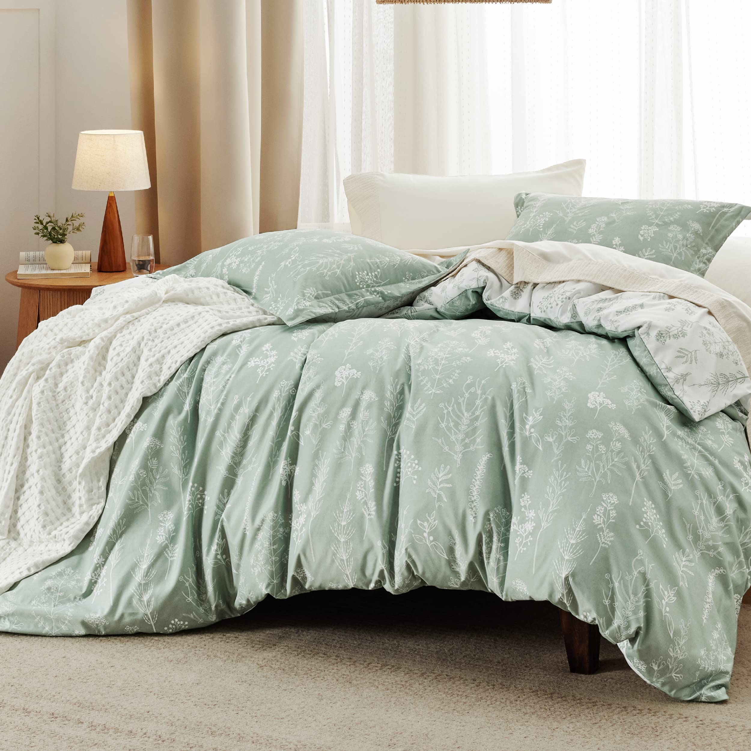 Bedsure sage green floral pillow shams complement the reversible set and enhance the look