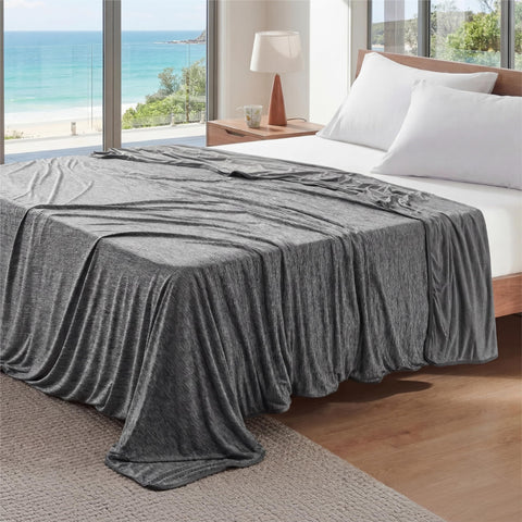 Bedsure Summer Cooling Blanket on bed delivers cool comfort for hot sleepers.