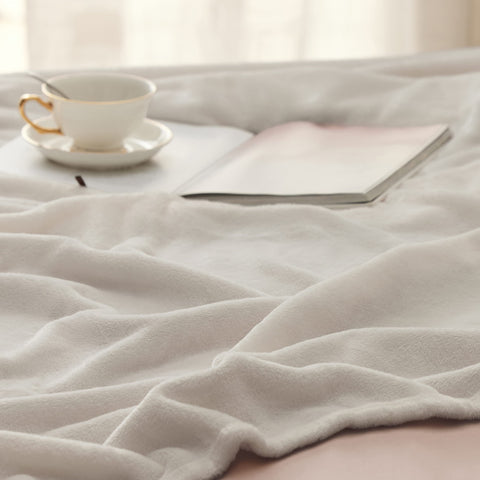 Bedsure travel-friendly blanket in compact pack for on-the-go use.