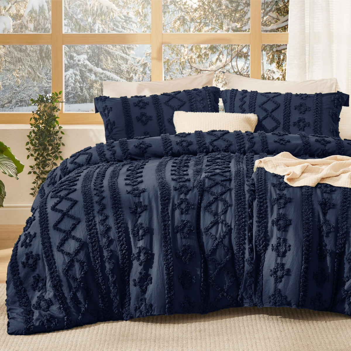 Bedsure tufted boho comforter in navy adds refined texture to queen beds.