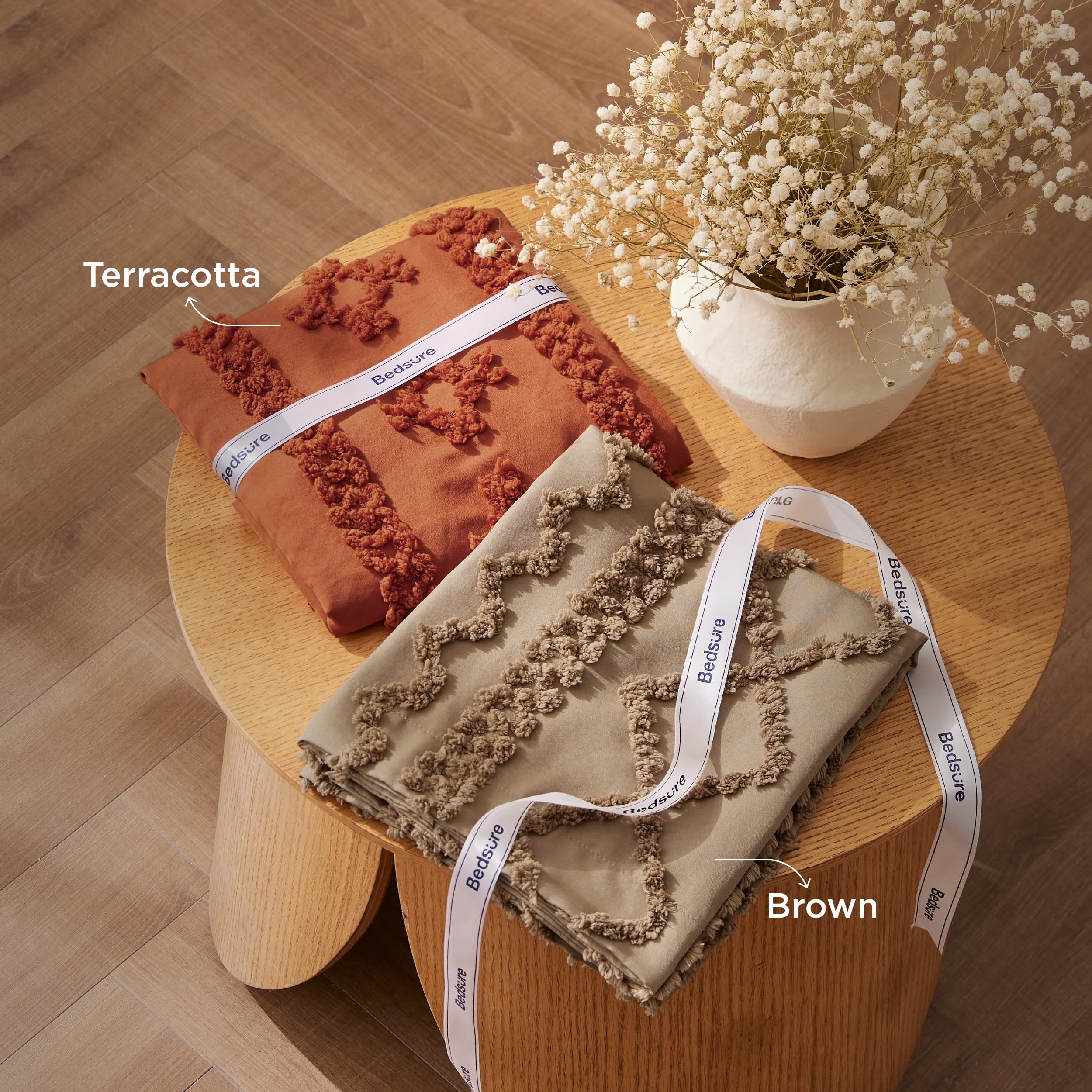 Bedsure embroidery detail reveals 30-step tufting for dimensional depth.