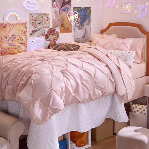 Bedsure pink sheet set with smooth microfiber finish for all-season comfort.