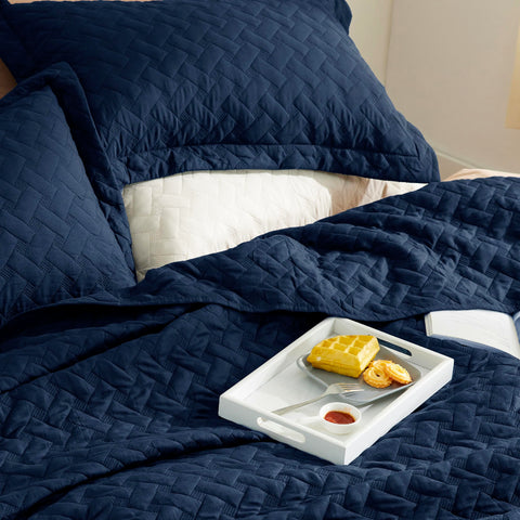 Bedsure two pillow shams complete the king quilt set.