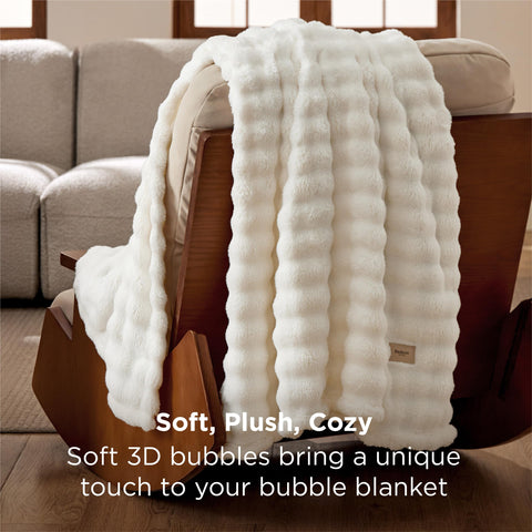 Bedsure ultra-soft plush fabric blanket feels gentle against skin for lounging.
