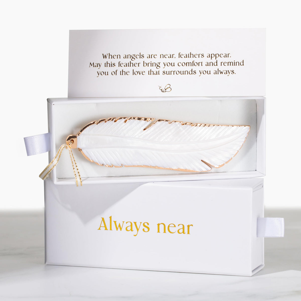 Bee! Hand-carved Angel's Feather memorial ornament with seashell artistry for remembrance.