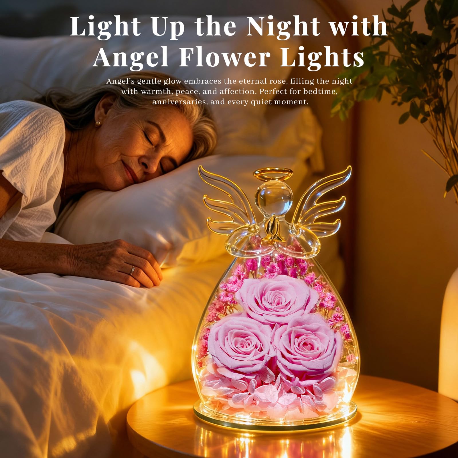 Beferr crystal glass angel dome frames a delicate rose display.