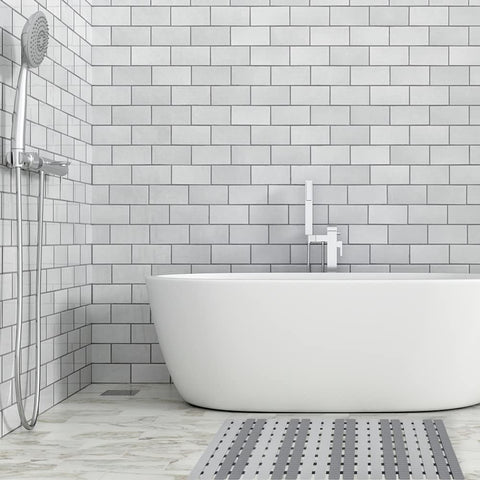 Bemiso cuttable shower mat trims to fit any tub or space.