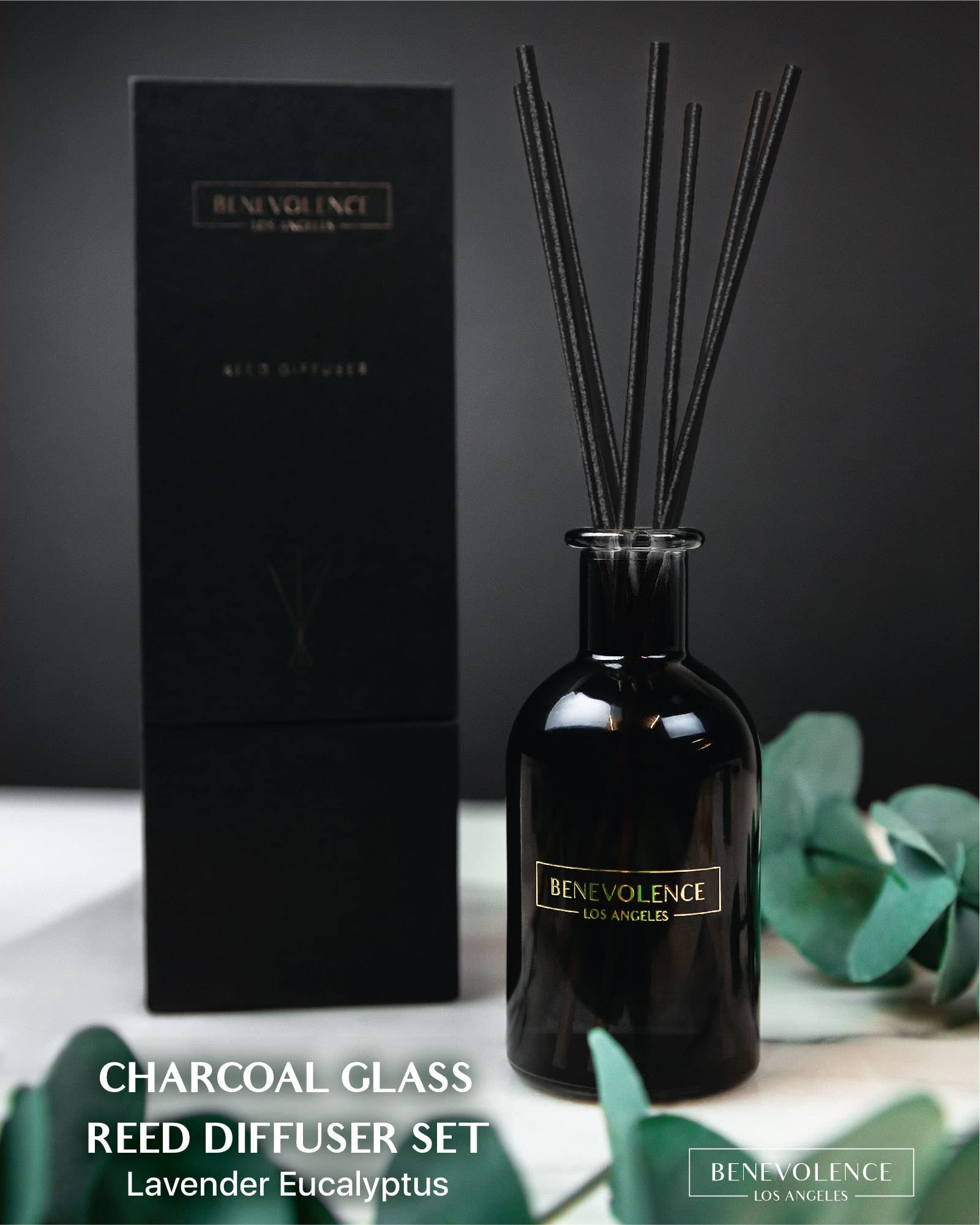 Benevolence LA diffuser with charcoal glass vase as decor accent