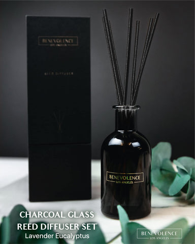 Benevolence LA diffuser with charcoal glass vase as decor accent