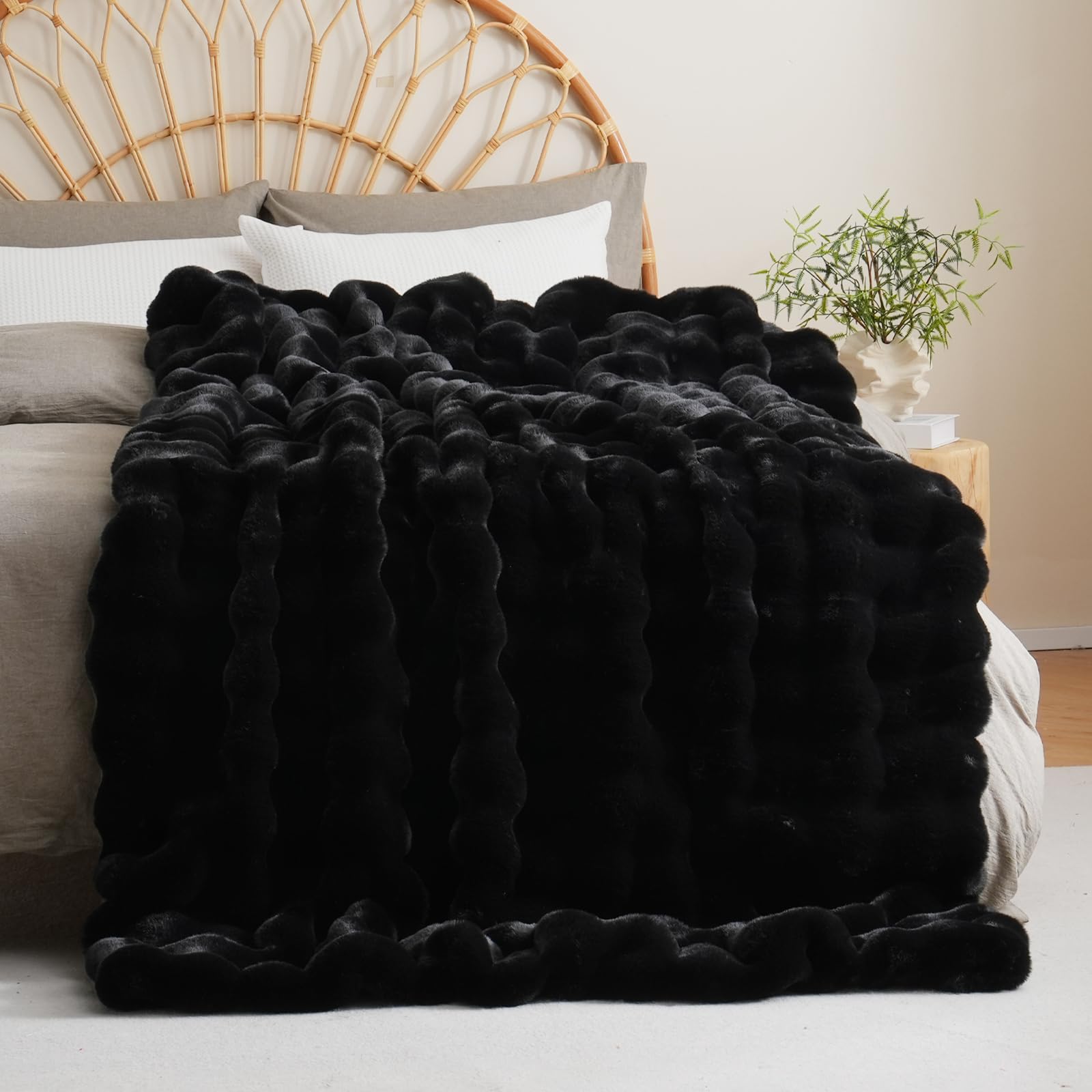 BENVWE bedroom decor blanket adds warmth and style to the bed.