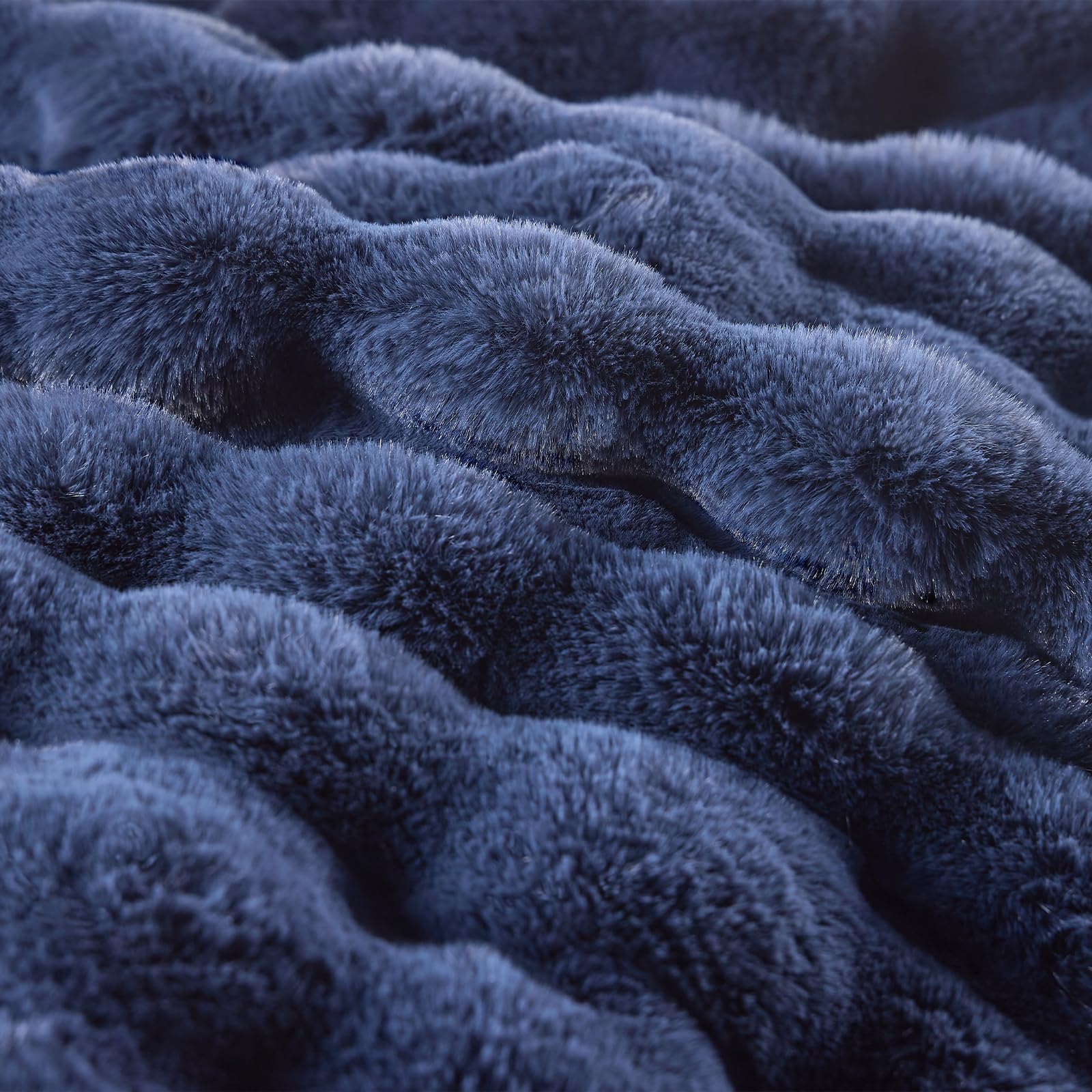 BENVWE navy throw enhances bedroom and living room decor.