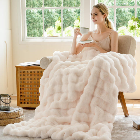 BENVWE cozy throw blanket draped on a couch for living room comfort