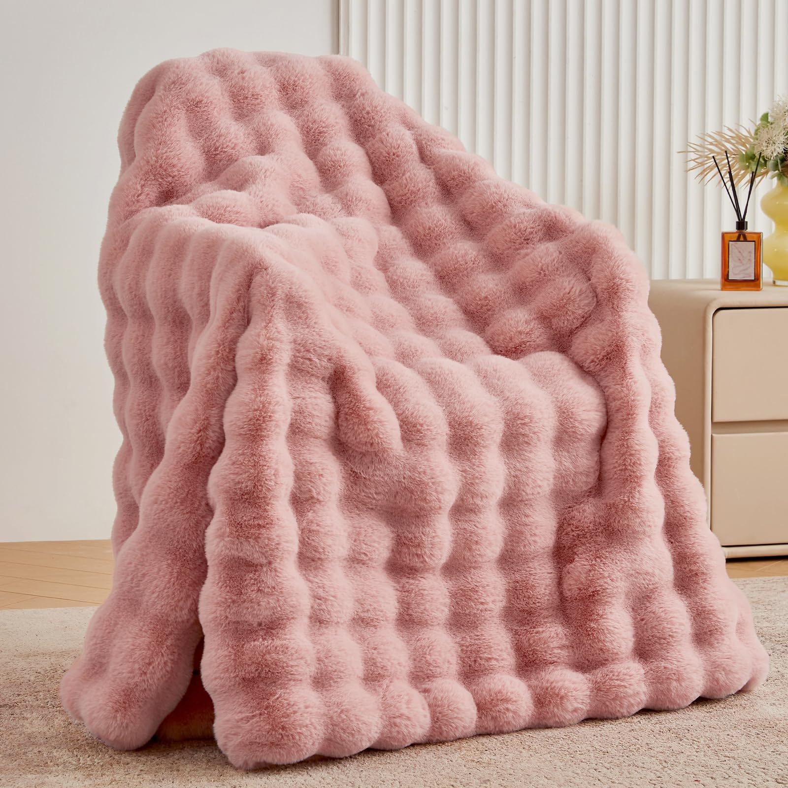 BENVWE dusty pink faux fur throw blanket on couch for cozy living room warmth