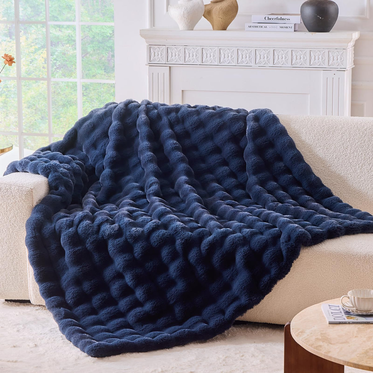 BENVWE fluffy faux fur throw in navy color for couch warmth and luxury.