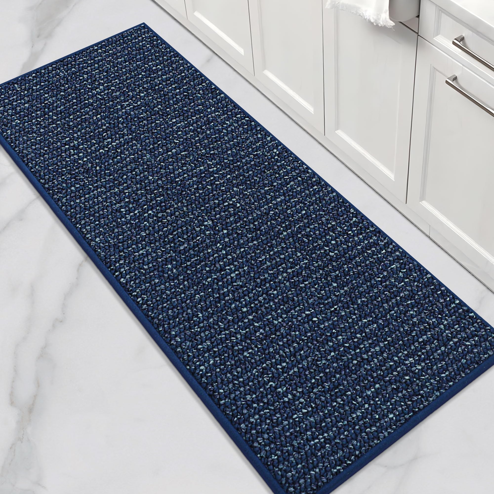 BEQHAUSE kitchen runner rug in blue absorbs spills and protects floors.
