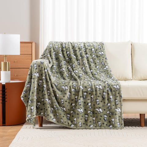 Berkshire Blanket Snoopy poses and paws artwork for playful living rooms.