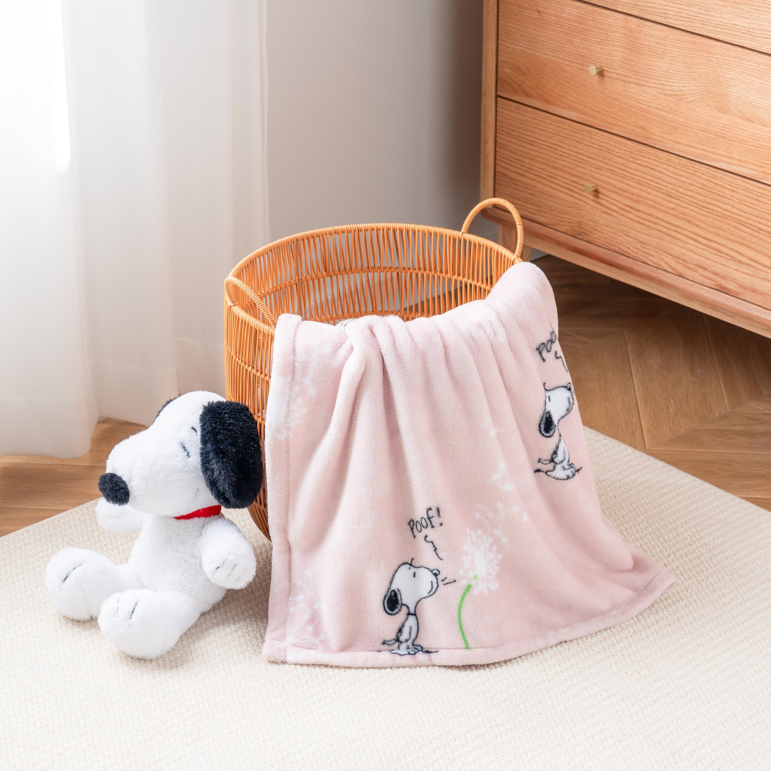 Make A Wish Spring Pink color on Berkshire Blanket Snoopy throw adds cheerful decor.