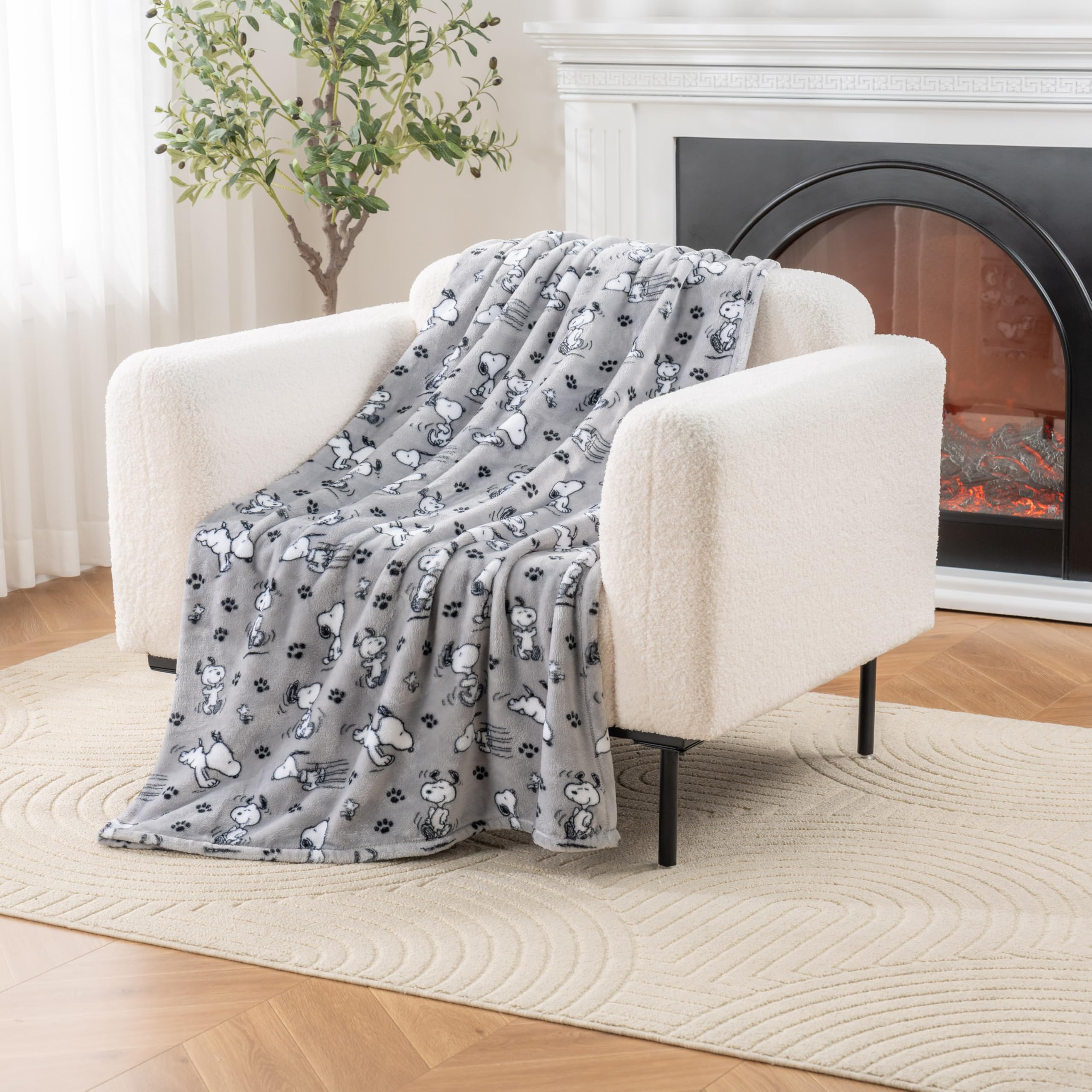 Berkshire Blanket Snoopy VelvetLoft throw closeup shows plush texture and cozy warmth.