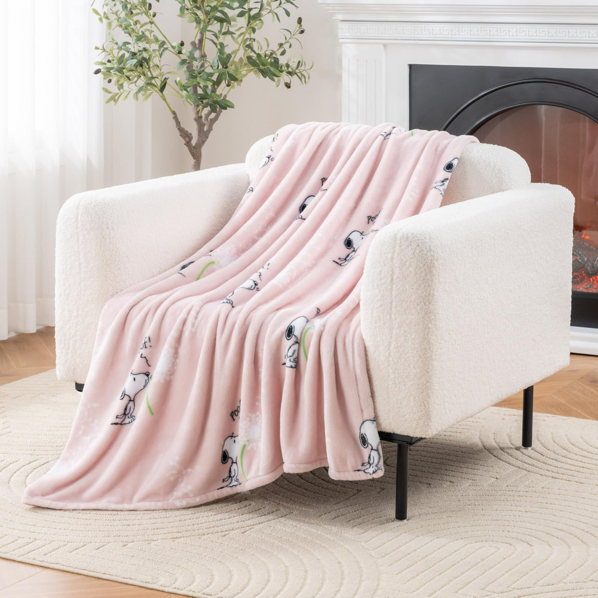Berkshire Blanket Peanuts VelvetLoft Snoopy throw folded, plush texture for cozy evenings.
