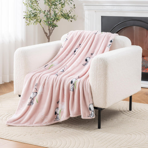 Berkshire Blanket Peanuts VelvetLoft Snoopy throw folded, plush texture for cozy evenings.