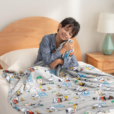 Grey Berkshire Blanket Snoopy throw visual invites couch snuggling.