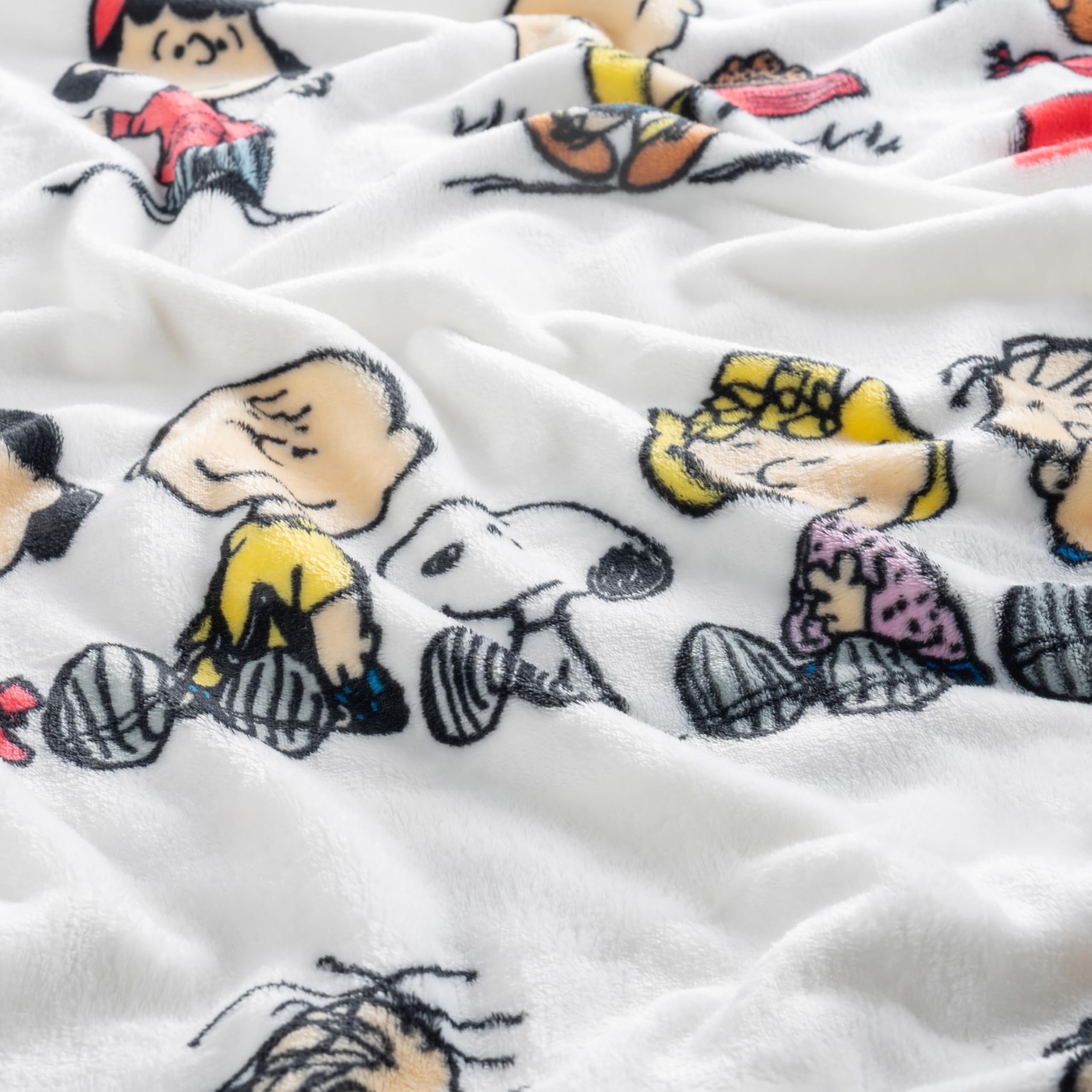 Berkshire Blanket VelvetLoft Peanuts Snoopy Throw Christmas procession, elegant sheen and plush softness.