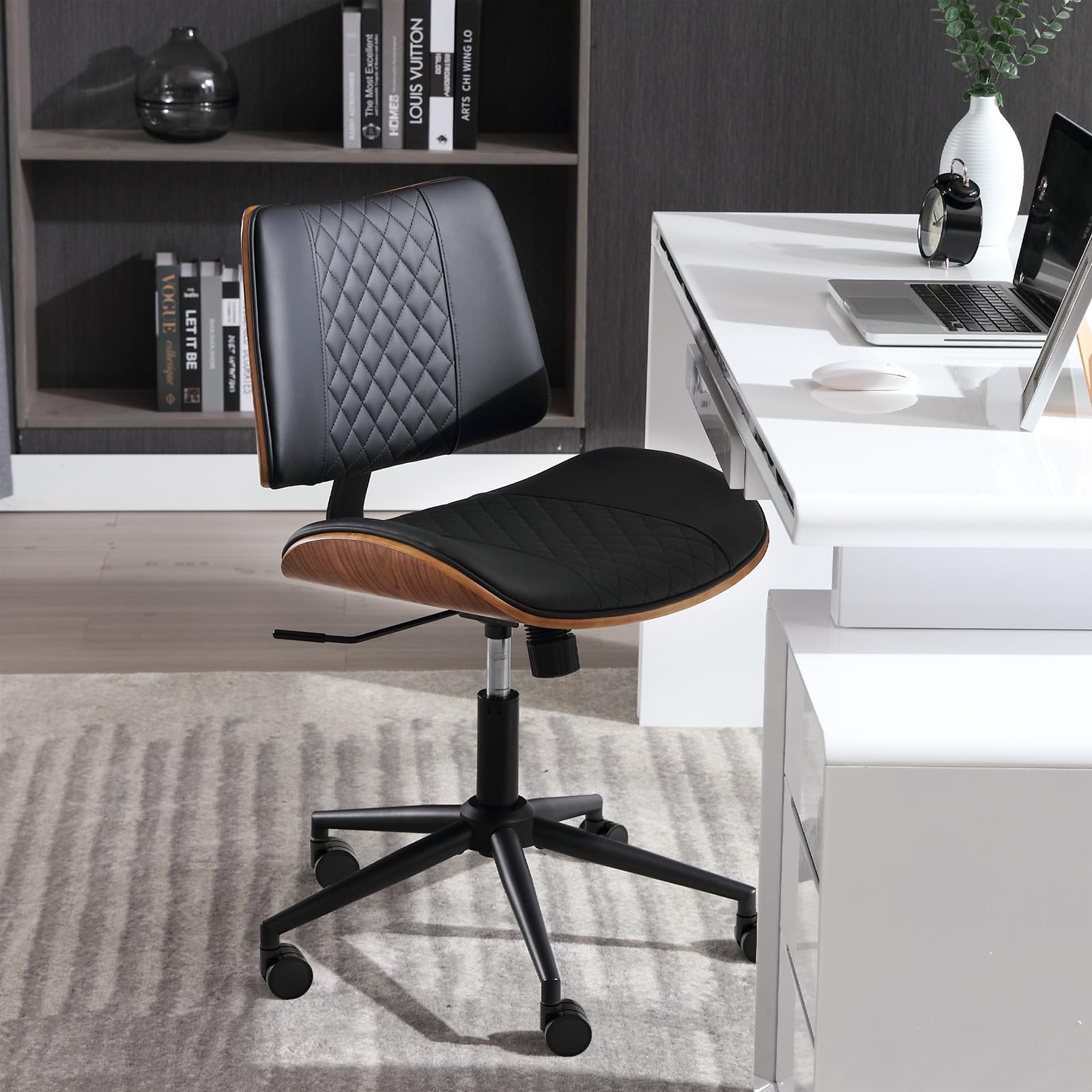 BERYTH adjustable height chair demonstrates range from 19.3 inches to 23.3 inches.