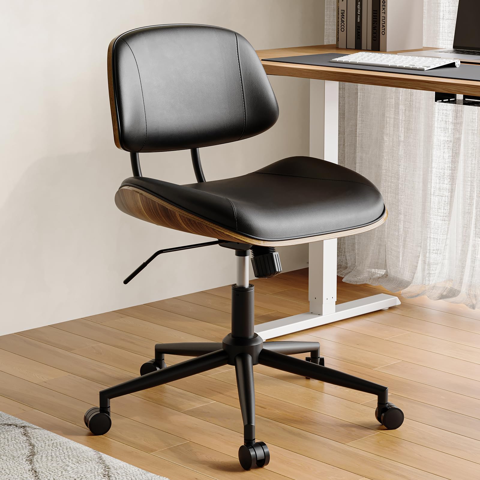 BERYTH armless office chair with wheels, front view showing mobility for small spaces