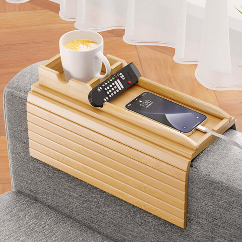Bestjing bamboo sofa armrest tray on a couch provides a natural surface for drinks and remotes.