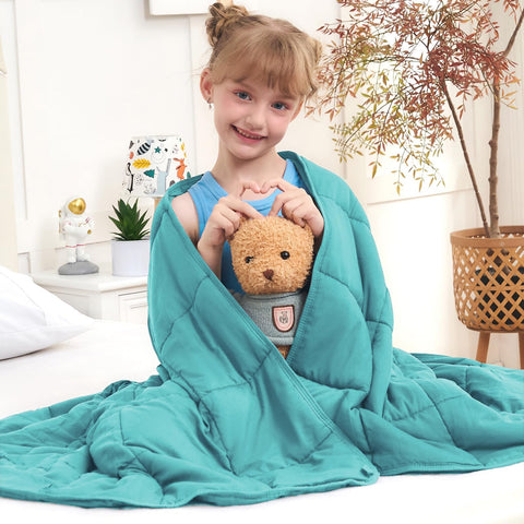 BETU teal weighted blanket for kids on bed delivers cozy comfort.