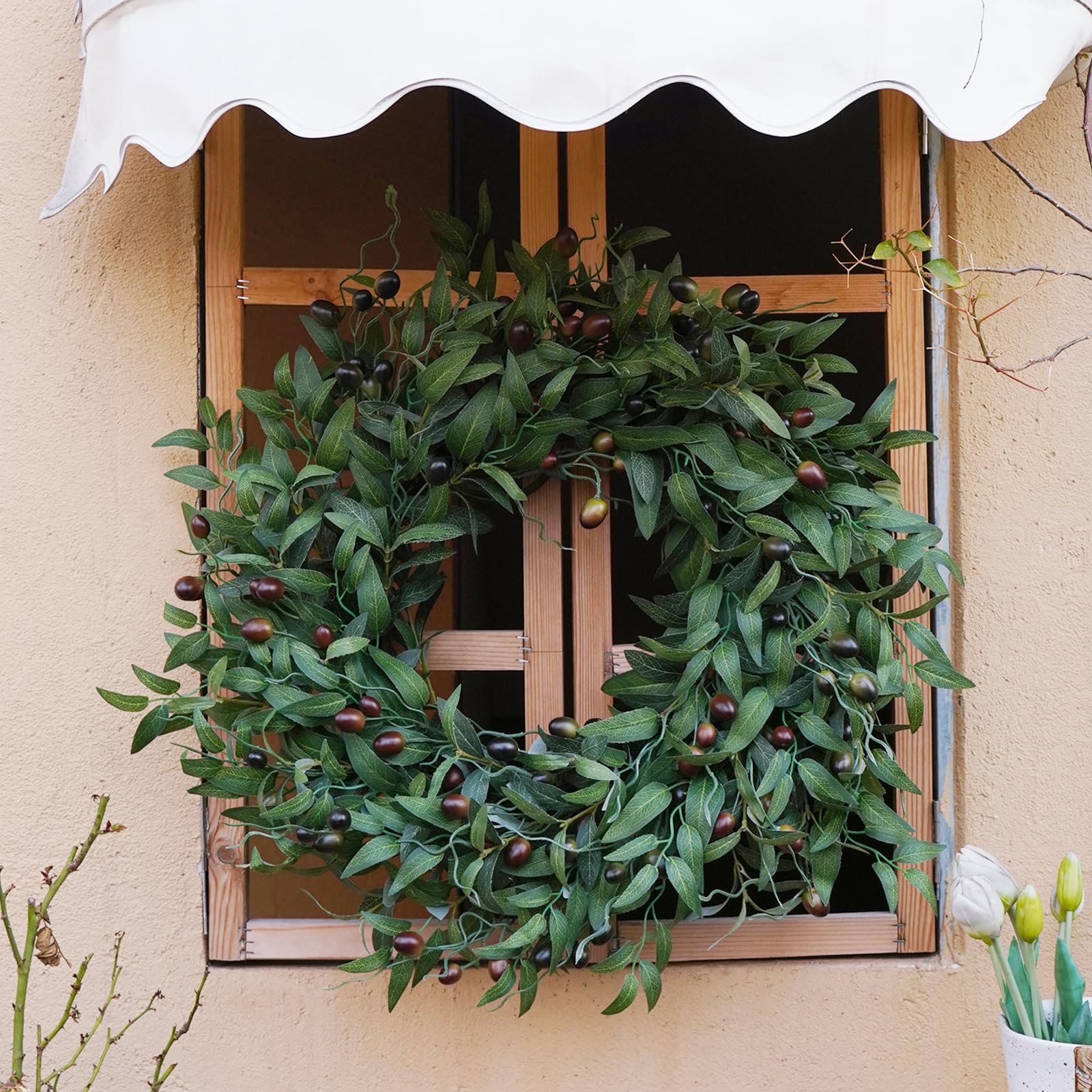 Close-up of BHHDA olive wreath leaves showing lifelike texture and color