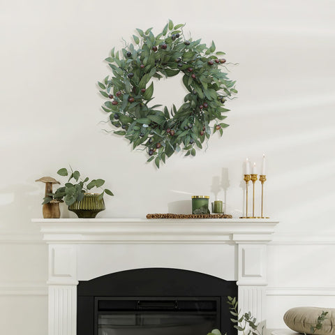 BHHDA olive wreath complements living room decor across seasons.