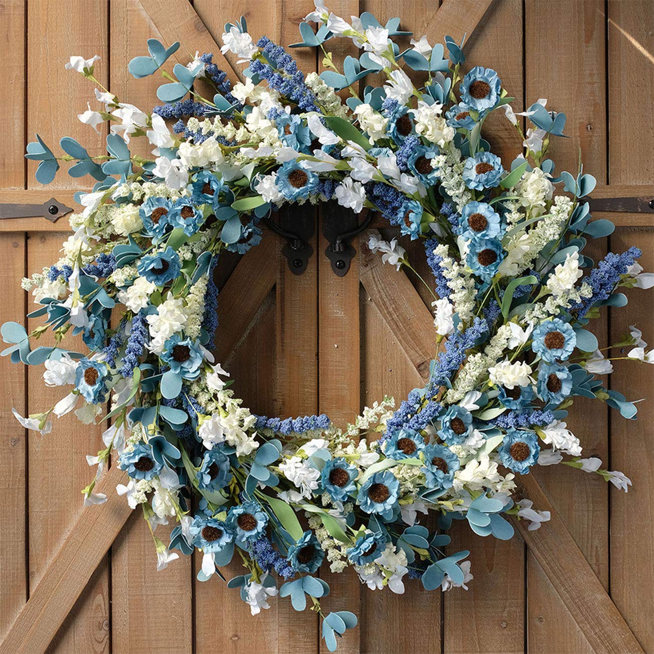 Bibelot 22inch spring wreath with blue and green leaves for inviting front door decor