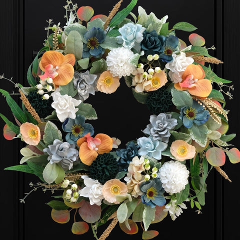 Bibelot 22-inch wreath on front door with blue and white gardenias for curb appeal