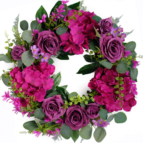 Bibelot artificial purple rose wreath on front door for warm curb appeal