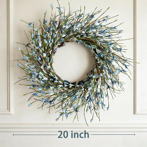 Bibelot Forsythia wreath enhances fireplace area with soft blue blossoms.