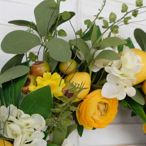 Bibelot wreath suits wall, window, or fireplace embellishment.
