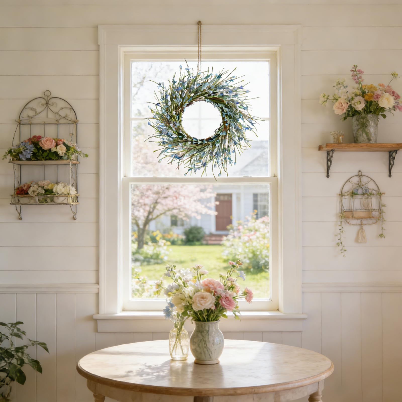 Bibelot outdoor-friendly Forsythia wreath hung on a covered porch.