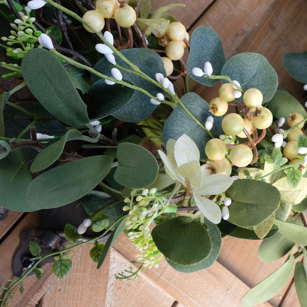 Bibelot wreath suitable for indoor and covered outdoor spaces.
