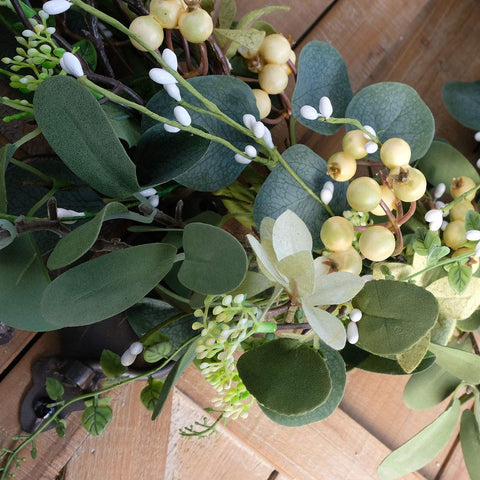Bibelot wreath suitable for indoor and covered outdoor spaces.