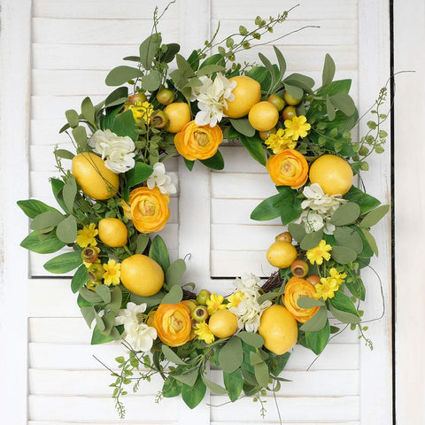 Bibelot yellow lemons and peony blooms brighten porch décor.