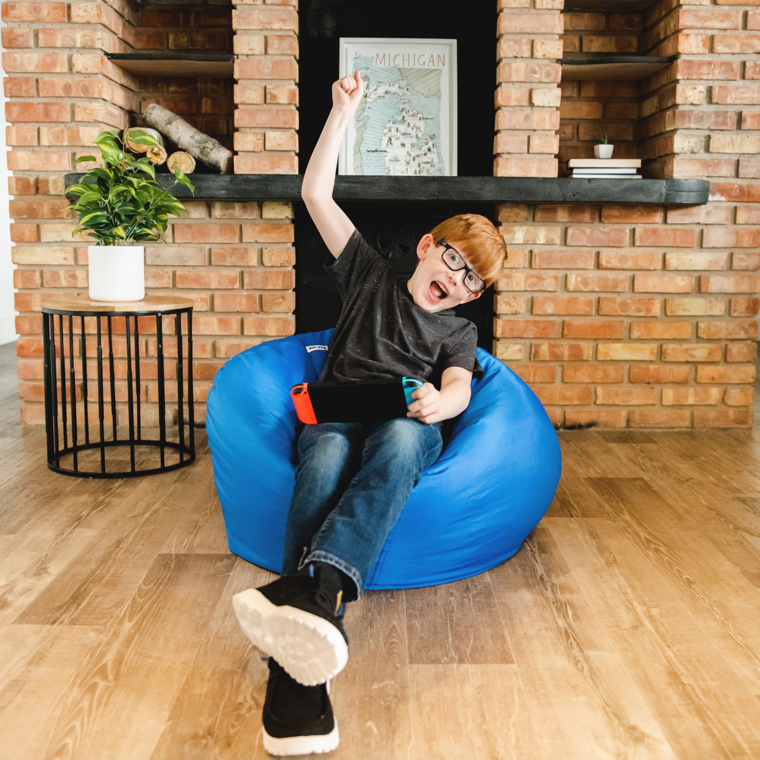 Big Joe Classic bean bag chair in sapphire is perfectly filled for comfort.