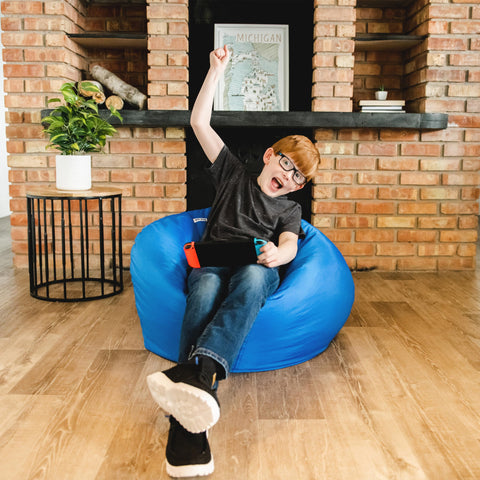 Big Joe Classic bean bag chair in sapphire is perfectly filled for comfort.