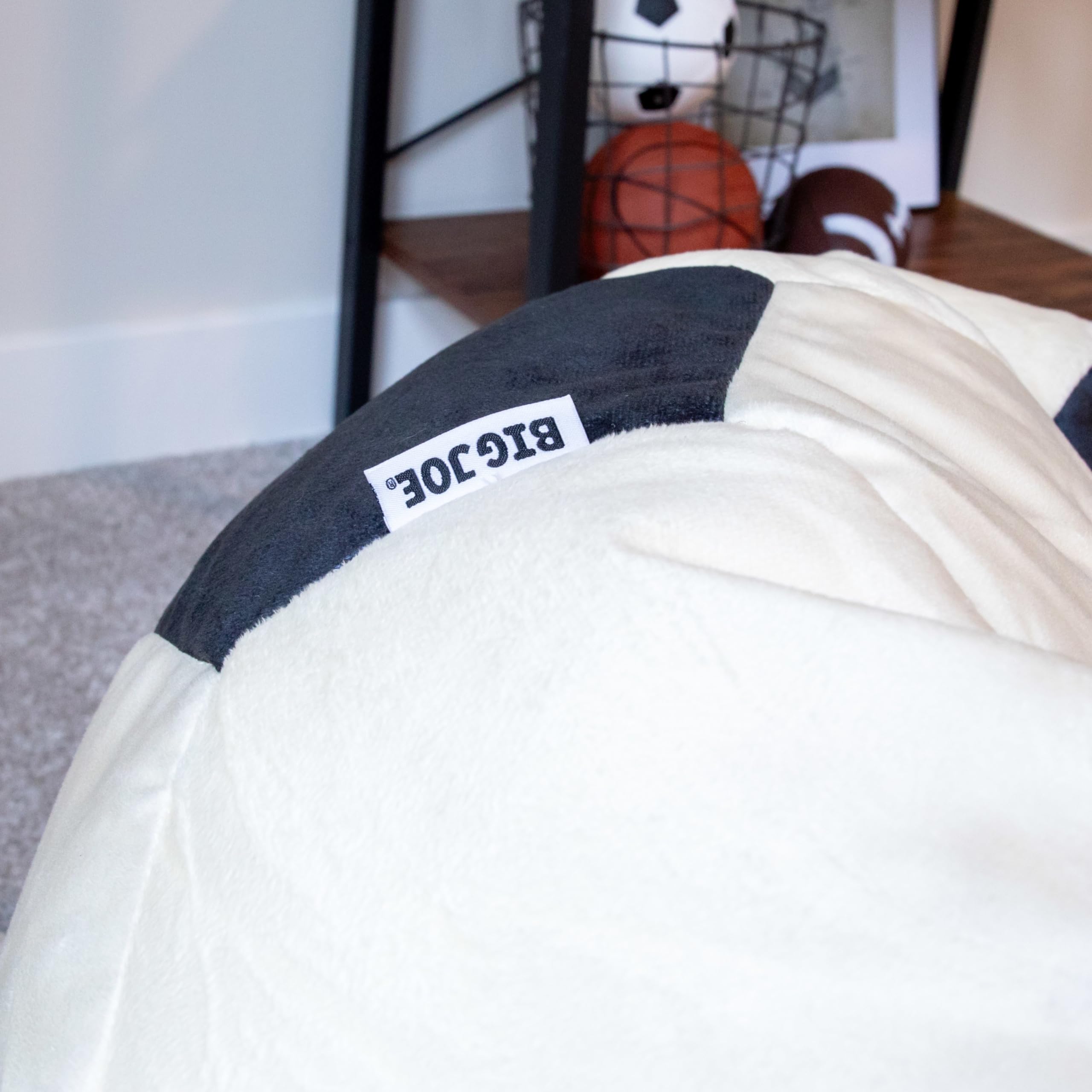 Double-stitched seams on the Big Joe Sports Ball bean bag for durability.