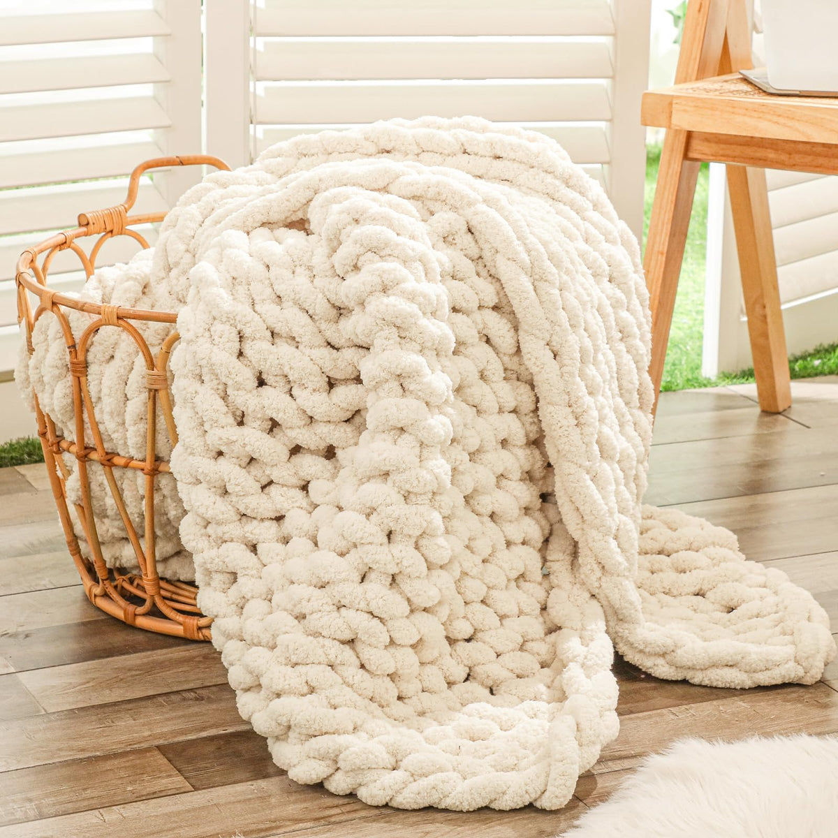 Bigacogo chunky knit throw with holey pattern offers breathable warmth on the couch
